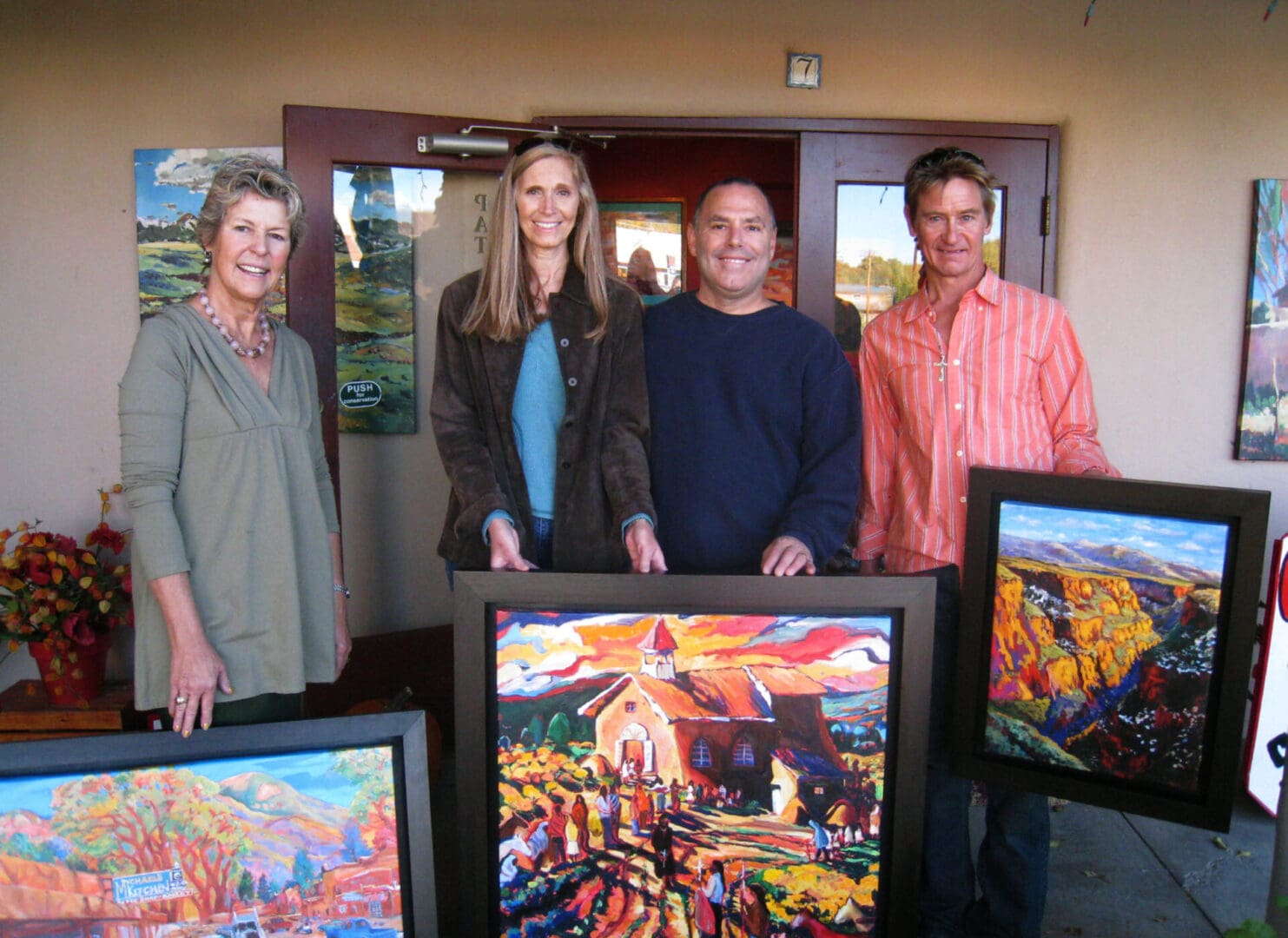Clients with their new paintings