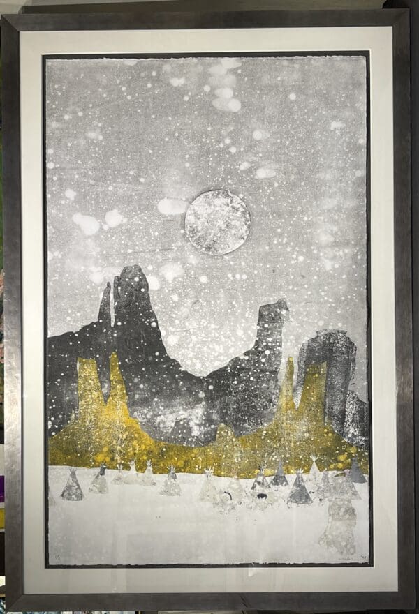A "Western Riders Full Moon" framed print of a mountain scene with a moon in the background.