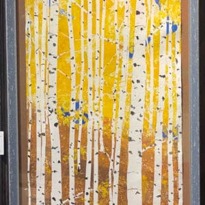 Framed painting of a birch forest.